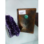 AN ARTS AND CRAFTS STYLE BOUND BIBLE AND A QUARTZ GEODE SPECIMEN.