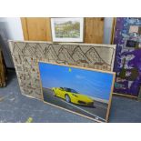 A LARGE FRAMED PHOTOGRAPH OF A FERRARI 430 SPIDER. TOGETHER WITH AN ETHNIC TEXTILE PANEL, OF RURAL