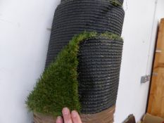 A ROLL OF ASTRO TURF, APPROX 450 x 200cm.