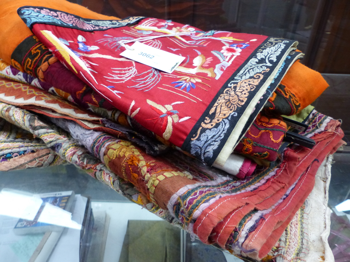 A SMALL COLLECTION OF EASTERN AND ORIENTAL TEXTILES.