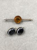 SILVER AND ORANGE FACETED PASTE BAR BROOCH, TOGETHER WITH A PAIR OF ANTIQUE BULLS EYE AGATE EARRINGS