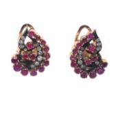 AN ANTIQUE PAIR OF DIAMOND AND RUBY, PRECIOUS YELLOW METAL CLIP ON EARRINGS. THE GRADUATED ARCH OF