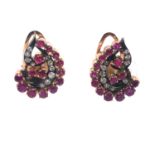 AN ANTIQUE PAIR OF DIAMOND AND RUBY, PRECIOUS YELLOW METAL CLIP ON EARRINGS. THE GRADUATED ARCH OF