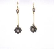 A PAIR OF ANTIQUE 15ct STAMPED AND ASSESSED YELLOW GOLD AND SEED PEARL CLUSTER AND BAR ARTICULATED