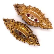 A NEAR PAIR OF EDWARDIAN 9ct GOLD PEARL AND RUBY BROOCHES. DATED 1904-1906, TOWN MARK CHESTER.
