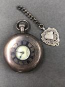 A SILVER HALLMARKED J.W.BENSON LONDON 15 JEWELLED POCKET WATCH COMPLETE WITH ATTACHED CHAIN AND FOB.