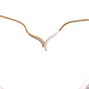 AN ITALIAN 9ct HALLMARKED GOLD AND DIAMOND TWO COLOUR NECKLACE. APPROX 0.25cts OF DIAMONDS IN TWO