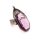 AN ART DECO WHITE METAL, MARCASITE AND AMETHYST PENDANT, FITTED WITH A HINGED OUTER FRAME. MEASUREME