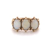 A THREE STONE OPAL AND PRECIOUS YELLOW METAL CARVED HALF HOOP RING,THE HALLMARKS INDISTINCT AND