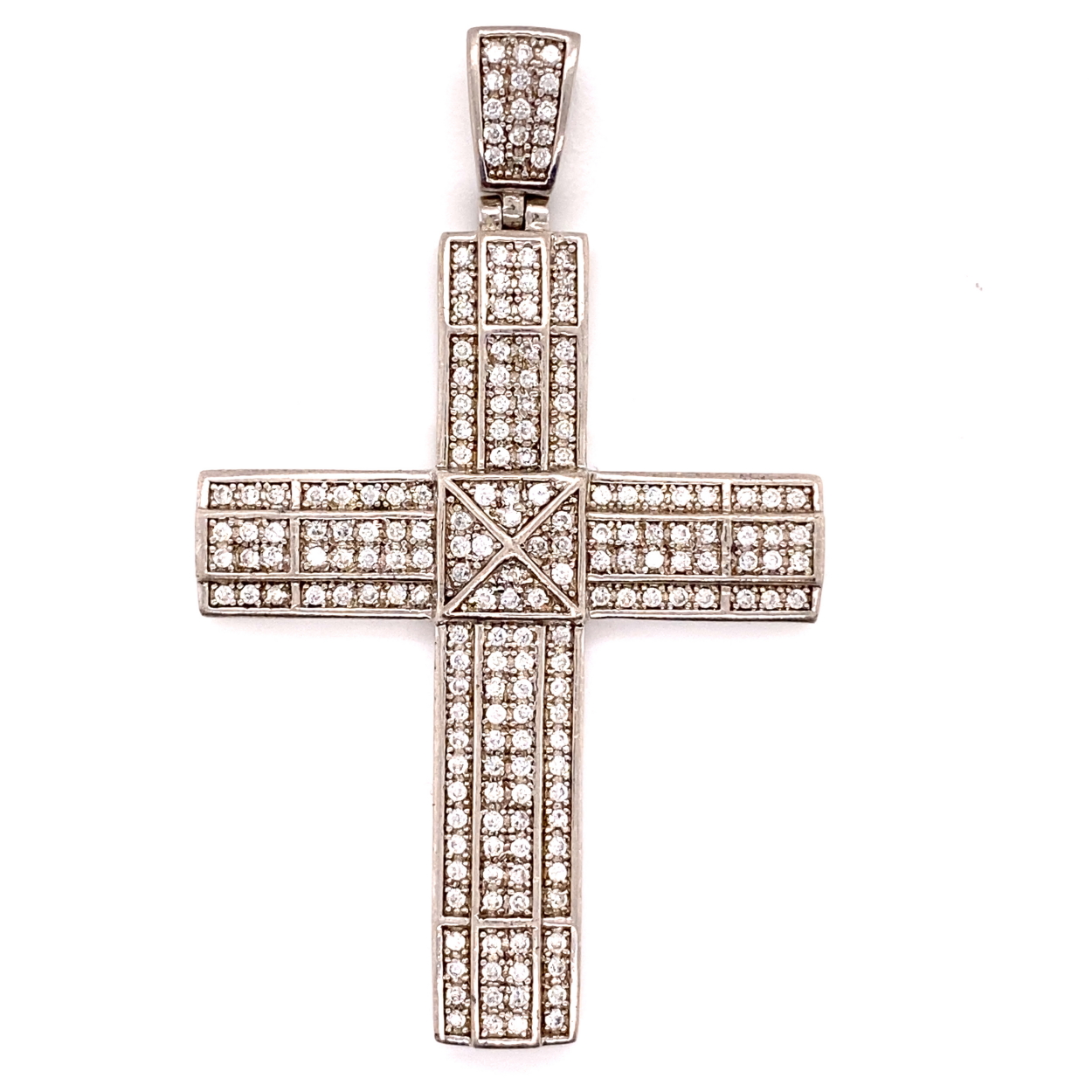 A SILVER AND MULTI CUBIC ZIRCONIA GRAIN SET LARGE CROSS PENDANT WITH ARTICULATED BALE. STAMPED 925