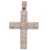 A SILVER AND MULTI CUBIC ZIRCONIA GRAIN SET LARGE CROSS PENDANT WITH ARTICULATED BALE. STAMPED 925