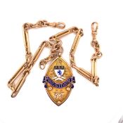 A VINTAGE 9ct OLD GOLD DOUBLE ALBERT WATCH CHAIN AND ATTACHED 9ct GOLD ENAMEL PRESIDENTS FOB. THE