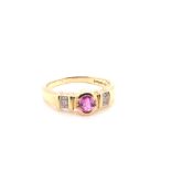 A 9ct YELLOW GOLD HALLMARKED PINK RUBY AND DIAMOND SET RING. FINGER SIZE L 1/2. WEIGHT 2.5grms.