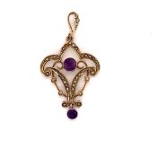 AN ART NOUVEAU AMETHYST AND SEED PEARL PENDANT WITH ARTICULATING AMETHYST DROPPER. UNMARKED,