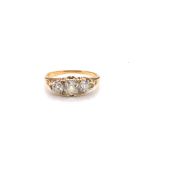 AN ANTIQUE 18ct YELLOW GOLD (TESTED) THREE STONE OLD CUT DIAMOND CARVED HALF HOOP RING WITH SIX