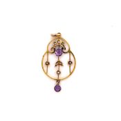 A 9ct GOLD STAMPED ANTIQUE AMETHYST AND SEED PEARL PENDANT WITH ARTICULATED AMETHYST DROPPER.