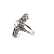 A DIAMOND AND SAPPHIRE ART DECO STYLE COCKTAIL RING. THE CENTRE DIAMOND AN OLD CUT IN A BEZEL