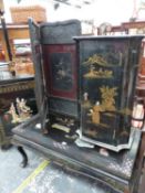 A CHINOISERIE BLACK LACQUER BEDSIDE CUPBOARD, A CHINESE STONE INLAID COFFEE TABLE AND A JAPANESE TWO