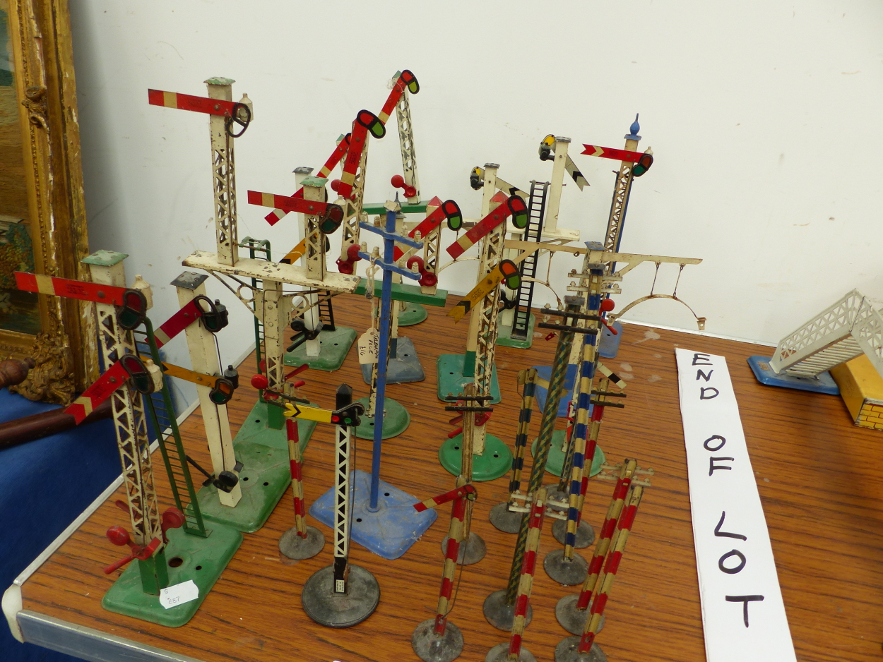 A COLLECTION OF HORNBY SIGNALS, THREE GANTRIES AND VARIOUS TELEGRAPH POLES