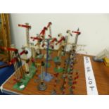 A COLLECTION OF HORNBY SIGNALS, THREE GANTRIES AND VARIOUS TELEGRAPH POLES