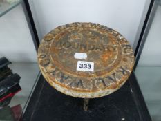 A CAST IRON GREAT WESTERN RAIL COMPANY BOUNDARY MARKER