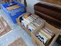 A LARGE QUANTITY OF VARIOUS RECORD ALBUMS AND SINGLES.