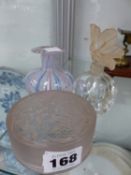 A LALIQUE GLASS LIDDED POWDER JAR, A SMALL SIGNED GLASS SCENT BOTTLE AND A SMALL VASE.