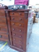 A MAHOGANY WELLINGTON CHEST OF SEVEN DRAWERS