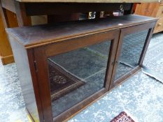 A GLAZED MAHOGANY LOW CUPBOARD. W 124 x D 26 x H 58.5cms.