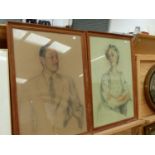 MID 20TH CENTURY ENGLISH SCHOOL. A PAIR OF PASTEL PORTRAIT STUDIES INDISTINCTLY SIGNED AND DATED E