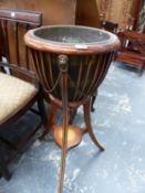 A SMALL MAHOGANY INLAID PLANTER STAND WITH BRASS LINER.