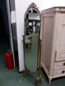 A BRASS FRAMED FULL LENGTH DRESSING MIRROR