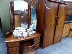 AN ART DECO WALNUT THREE PIECE BEDROOM SUITE WITH DRESSING TABLE, COMPACTUM WARDROBE AND LOW CABINET