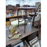 THREE OCCASIONAL TABLES, A BEDSIDE CUPBOARD AND AN OAK DESK.