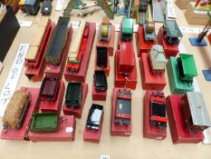 TWENTY HORNBY BOXED O GAUGE WAGONS AND TENDERS