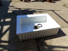 A LARGE CERAMIC SINK.