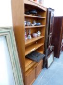 A MODERN TEAK OPEN FRONT BOOKCASE. W 87 X D 27 X H 193CMS.