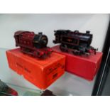 A HORNBY BOXED O GAUGE CLOCKWORK LMS 040 LOCOMOTIVE TOGETHER WITH A BLACK BRITISH RAIL 040