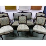 A VICTORIAN EBONISED SHOW FRAME SUITE OF THE SETTEE AND FIVE VARIOUS CHAIRS