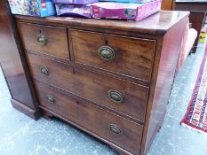 A MAHOGANY CHEST OF TWO SHORT AND TWO LONG DRAWERS ON BRACKET FEET