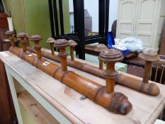 TWO ANTIQUE FAUX BAMBOO COAT RACKS.