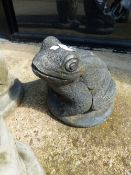 A COMPOSITE FROG GARDEN ORNAMENT.