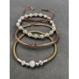 FOUR VARIOUS STERLING SILVER, ROSE AND YELLOW GILDED BRACELETS, TWO STONE SET EXPANDING EXAMPLES,