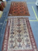 AN AFGHAN BOKHARA RUG 189X 120CM T/W A TRIBAL BELOUCH RUG 158X 105CM