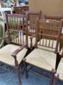 A GOOD SET OF EIGHT LANCASHIRE RUSH SEAT SPINDLE BACK DINING CHAIRS.