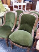 FOUR VICTORIAN OAK FRAMED SIDE CHAIRS ON CARVED TURNED LEGS.