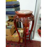 A CHINESE MARBLE INSET HARDWOOD STAND. H 92cms.