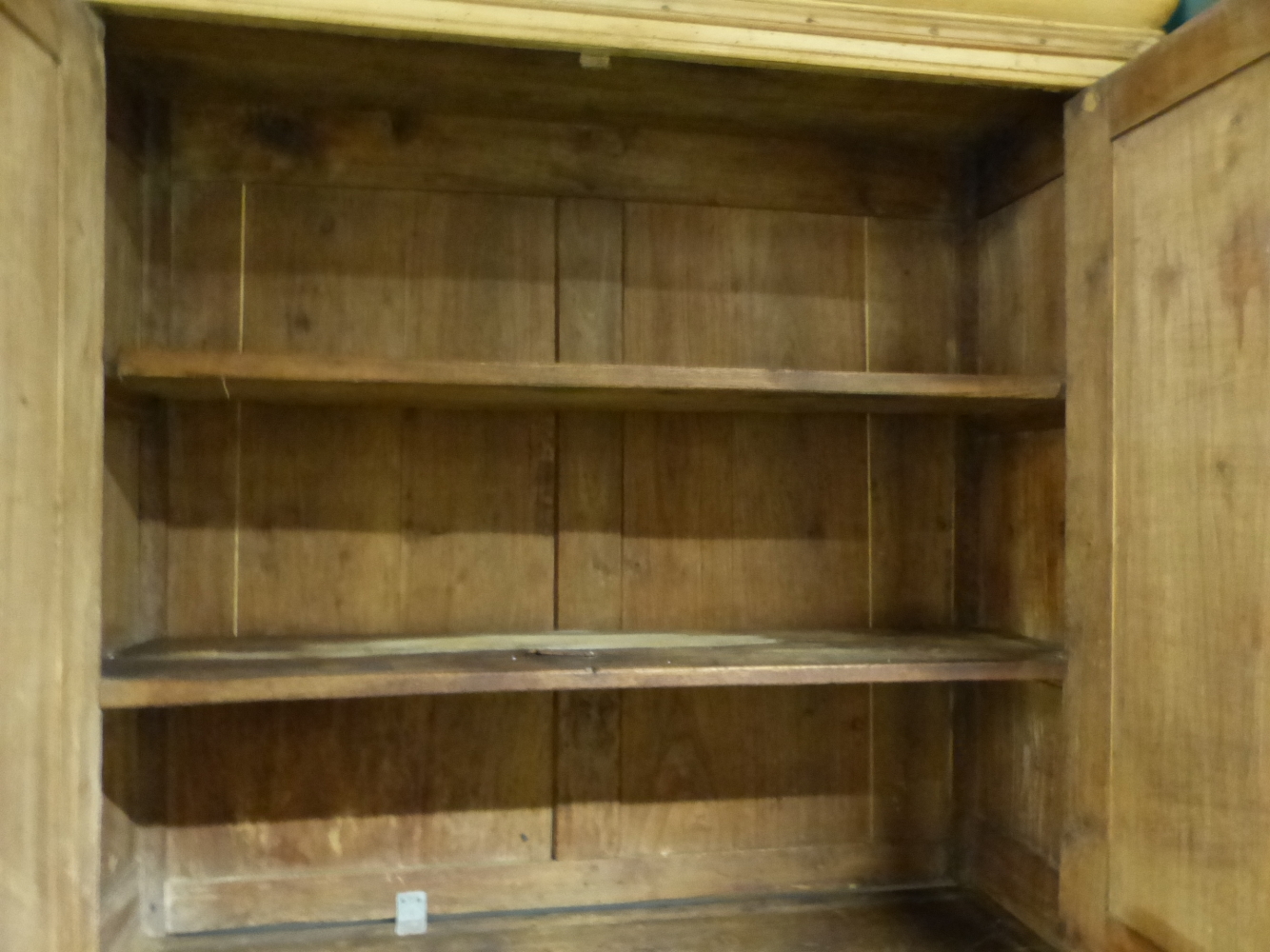 A PINE LINEN PRESS WITH CUPBOARDS ABOVE AND BELOW TWO CENTRAL DRAWERS. W 137 x D 54 x H 225cms. - Image 2 of 9