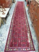 A PERSIAN HAMADAN RUNNER 492 X 81 CM