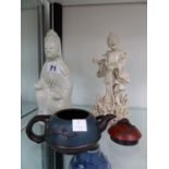 TWO CHINESE BLANC DE CHINE FIGURES, AND A SMALL ORIENTAL TEAPOT.